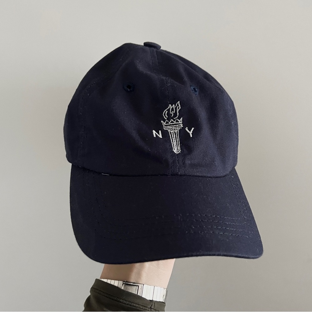NY marathon Olympic Torch white logo embroidery navy blue snapback cap